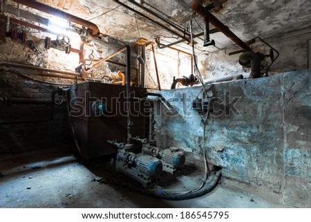 an old building\'s basement boiler room, detail