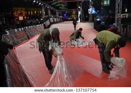 BERLIN - GERMANY - FEBRUARY 4: Employees at revealing the Red Carpet at the \