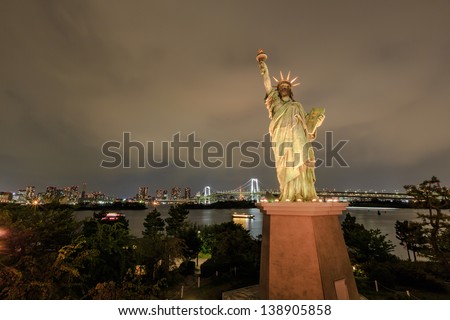 TOKYO - APRIL 12: Night shot of Statue of Liberty on April 12, 13 in Odaiba, Tokyo, JP. Odaiba is an artificial island in Tokyo originally built for defense in the 1850\'s.