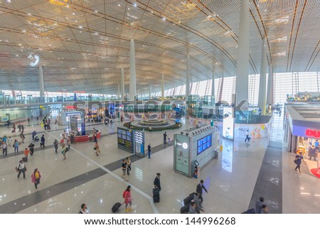 BEIJING JULE 30, Duty fee shopping area at Beijing airport  on June 30, 13 in Beijing. The airport has registered 488,495 annually aircraft movements and ranked 10th in the world.