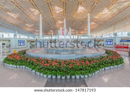 BEIJING- JULY 5, Air Fountain within terminal area of Beijing airport on July 5, 13 in Beijing . The airport has registered 488,495 annually aircraft movements and ranked 10th in the world.