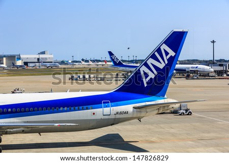 TOKYO - APRIL 13: All Nippon Airways (ANA) Boieng 767 at Narita Airport on April 13, 2013, ANA is one of largest airlines of Japan with 177 passenger planes