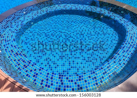 blue tiles of jacuzzi pool