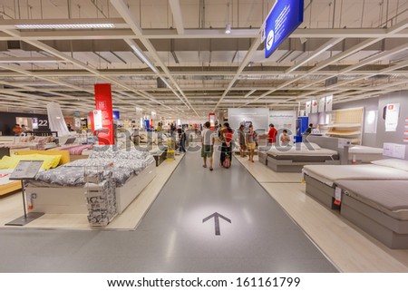 BANGKOK - OCTOBER 23: Direction sign on the floor of IKEA Bangkok Store on October 23, 2013 in Mega Bangna, Bangkok. Founded in Sweden in 1943, Ikea is the world\'s largest furniture retailer.