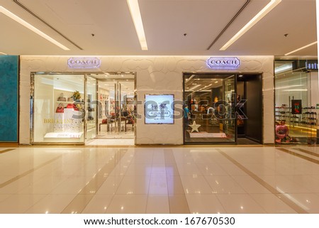 BANGKOK - DECEMBER 5 : Coach shop at Siam Paragon on Dec 5, 13. It is an American luxury leather goods company that got its start manufacturing small leather goods which know for ladies\' handbags.