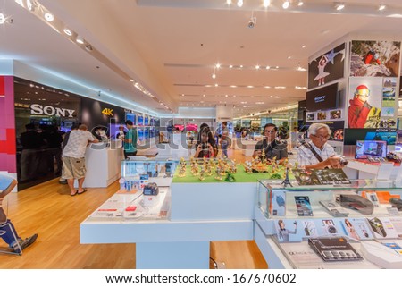 BANGKOK - DECEMBER 5: People shop in Sony shop at Siam Paragon on Dec 5, 13. The company is one of the leading manufacturers of electronic products, ranked 87th on the 2012 list of Fortune Global 500.