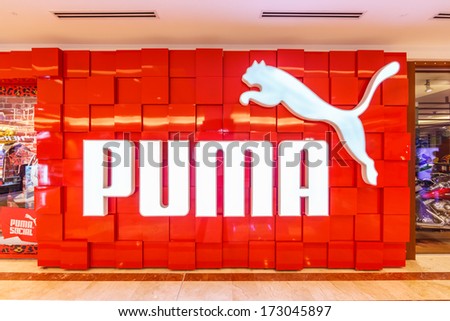 KUALA LUMPUR - DECEMBER 23: Puma shop on Dec 23, 2013 in KL. It is a major German multinational company that produces athletic and casual footwear, as well as sportswear.