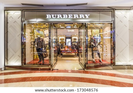Kuala Lumpur - Dec 23: Exterior Of Burberry Shop At Klcc On Dec 23, 13 In Kl, Malaysia. It Is A British Luxury Fashion House, Distributing Clothing, Fashion Accessories, Fragrances And Cosmetics.