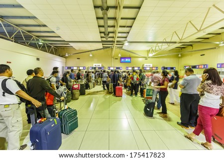 Kuala Lumpur - December 23: Passengers In Low Cost Carrier Terminal (Lcct) On Dec 23, 2013 In Kuala Lumpur, Malaysia. It Was Opened To Cater For The Growing Number Of Users Of Low Cost Airlines.