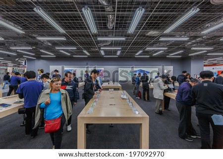 TOKYO -APRIL 11: People shop in Apple booth at Yodobashi electronic store on April 11, 14 in Akihabara. It is a chain store mainly selling electronic products. Currently, there are 21 stores in Japan.