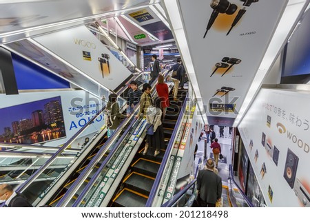 TOKYO -APRIL 11: Escalators at Yodobashi electronic store on April 11, 14 in Akihabara. It is a chain store mainly selling electronic products. Currently, there are 21 stores in Japan.