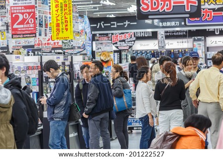 TOKYO -APRIL 11: People shop at Yodobashi electronic store on April 11, 14 in Akihabara, Tokyo, Japan. It is a chain store mainly selling electronic products. Currently, there are 21 stores in Japan.