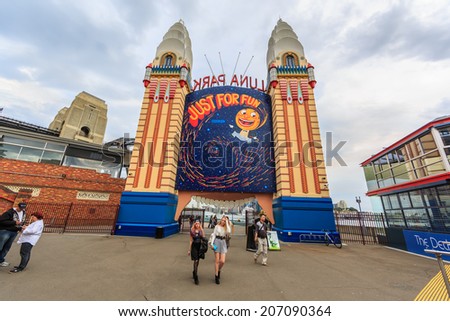 SYDNEY - MAY 10: Tourists visit Lunar Park on May 10, 14 in Sydney. It is an amusement park located at Milsons Point in Sydney, NSW, Australia.