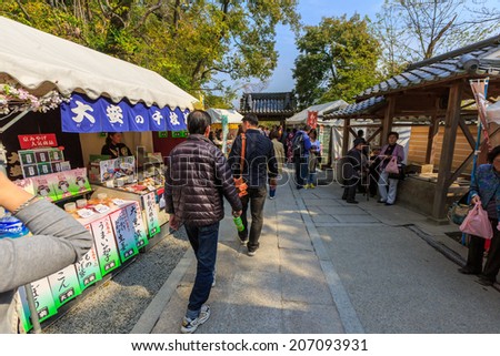 KYOTO, JAPAN - APR 8: Souvenirs  shops at Kinkaku-ji temple on Apr 8, 14 in Kyoto. It is a Zen Buddhist temple in Kyoto, the garden complex is an excellent example of Muromachi period garden design.