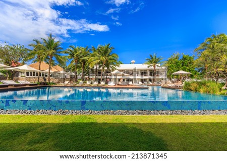 HUA HIN, THAILAND - MAY 23: Main pool of Putahracsa Hua Hin Hotel on May 23, 14. It is a new luxury hotel in Hua Hin, the design of the space, 59 units ranging from standard rooms to pool villas.
