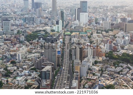 TOKYO - JUL 12: Tokyo Cityscape on Jul 12, 2014 in Tokyo. Tokyo is the capital of Japan, the center of the Greater Tokyo Area, and the most populous metropolitan area in the world.
