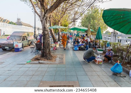 BANGKOK - AUG 2: Local traders at Na Phra Lan Street on Aug 2, 2014 in Bangkok. Bangkok is the capital and the most populous city of Thailand which is known in Thai as Krung Thep Maha Nakhon.