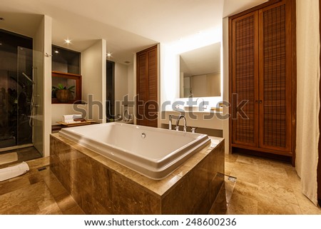 KHAO YAI, THAILAND - DEC 26: Rest room interior of Muti Maya Forest Pool Villa on Dec 26, 2014 in Khao Yai, Thailand. It\'s 7th most romantic resort of the world, reported by Reuters.