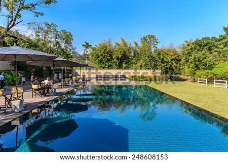 KHAO YAI, THAILAND - DEC 27: Main Swimming pool of Muti Maya Forest Pool Villa on Dec 27, 2014 in Khao Yai, Thailand. It/s 7th most romantic resort of the world, reported by Reuters.