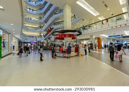 BANGKOK - DEC 5: People shop at Central World on Dec 5, 2014 in Bangkok. It is a shopping plaza and complex which is the sixth largest shopping complex in the world, owned by Central Pattana.