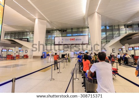 NEW DELHI - AUG 5: Passengers at Indira Gandhi International Airport on Aug 5, 2015 in New Delhi. The airport is the busiest airport in the country since 2009.
