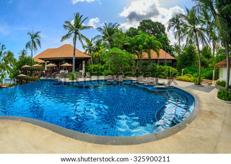 PATTAYA, THAILAND - MAY 24 : Swimming pool of Sea Sand Sun Hotel on May 24, 2015. The hotel consist of 60 boutique-style masterpiece Villas and Rooms in south Pattaya.