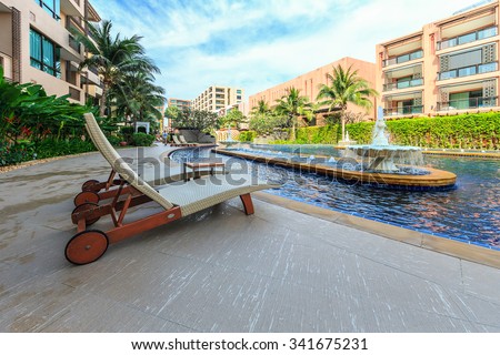 HUA HIN, THAILAND - DEC 14: Main pool of Marrakech Hotel on Dec 14, 2014 in Hua Hin. The design of the hotel was Inspired by rich and colorful culture of Morocco\'s Marrakech or \