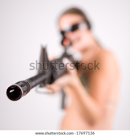 Girl with gun and glasses