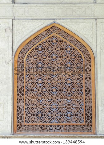 Islamic pattern wooden screen window in Chehel Sotoun (Sotoon) Palace built by Shah Abbas II, Isfahan, Iran