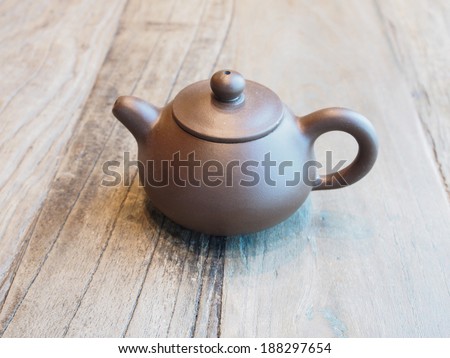 ceramic teapot  on wooden table
