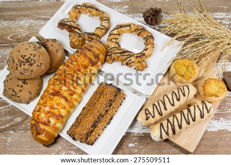 Composition  bakery products on wooden background