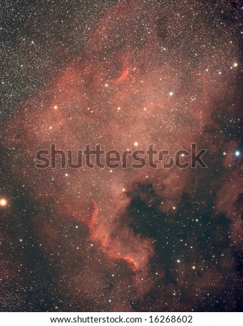 The North America Nebula in the night sky fulfilled with stars