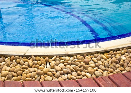 Luxury Resort Swimming Pool low angle on curved edge of a luxury resort swimming pool