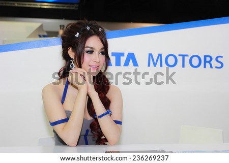 Nonthaburi, Thailand - November 29, 2014: Unidentified model  with TATA Motors pose in the 31th  Thailand International Motor Expo on November 29, 2014 in Nonthaburi, Thailand.