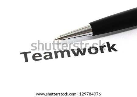 Teamwork with pen isolated close-up