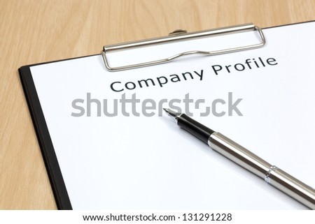 The word company close up in paper