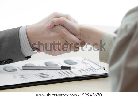 Business handshake and business people with Business Report