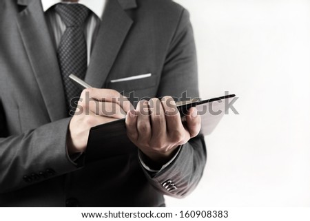 Accounting.Business records in the men\'s hands. isolated on white