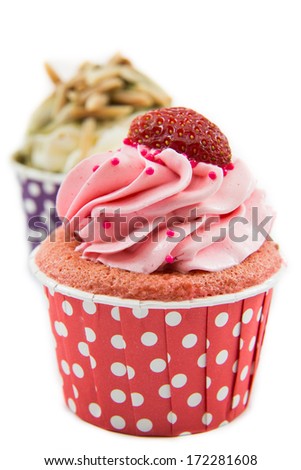 Tasty cupcake with butter cream on white background