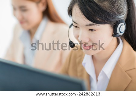 Asian women call center with phone headset