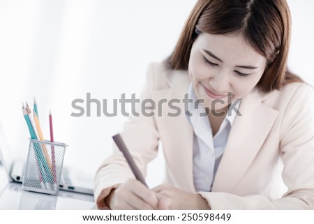 young asian businesswoman working in office