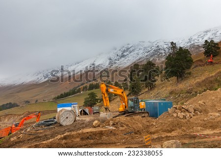ARKHYZ, KARACHAY-CHERKESSIA, RUSSIA - OCTOBER 10 2014: Construction of ski resort Arkhyz park. First part of cable car line is fully functional. This fall part of resort is ready for guests.