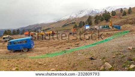 ARKHYZ, KARACHAY-CHERKESSIA, RUSSIA - OCTOBER 10 2014: Construction of ski resort Arkhyz park. First part of cable car line is fully functional. This fall part of resort is ready for guests.