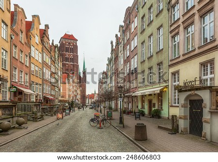 GDANSK, POLAND - JANUARY 15 2015 : Tourists and locals walking on streets in historical center of Gdansk city, Poland