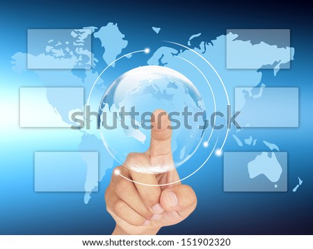 hand pushing a button on a touch screen interface. On a background map of the world.