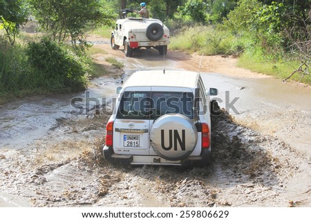 MUKJAR ,Southern Sudan - September 16, 2011: Thai Army troops patrol routes in the rainy season.THAI Military Peacekeeping mission in Southern Sudan