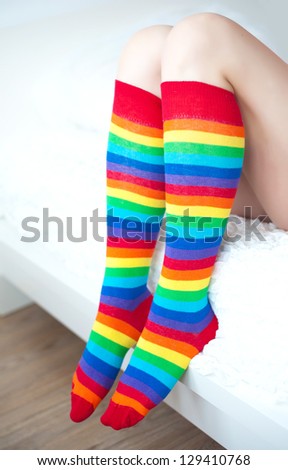 Legs in striped socks stockings