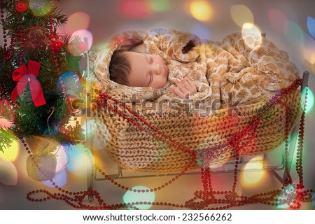 Adorable two month old baby boy or girl sleeping Happy New Year