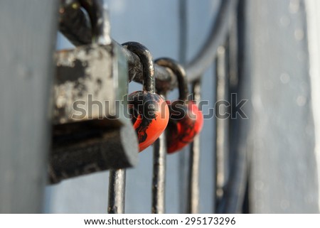 Padlocked on metal rods concrete structure