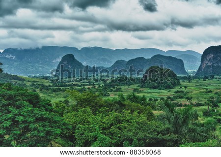 The beautiful Vinales Valley in Cuba. The Vinales Valley has been on UNESCO's World Heritage List since November 1999 as a cultural landscape enriched by traditional farm and village architecture.